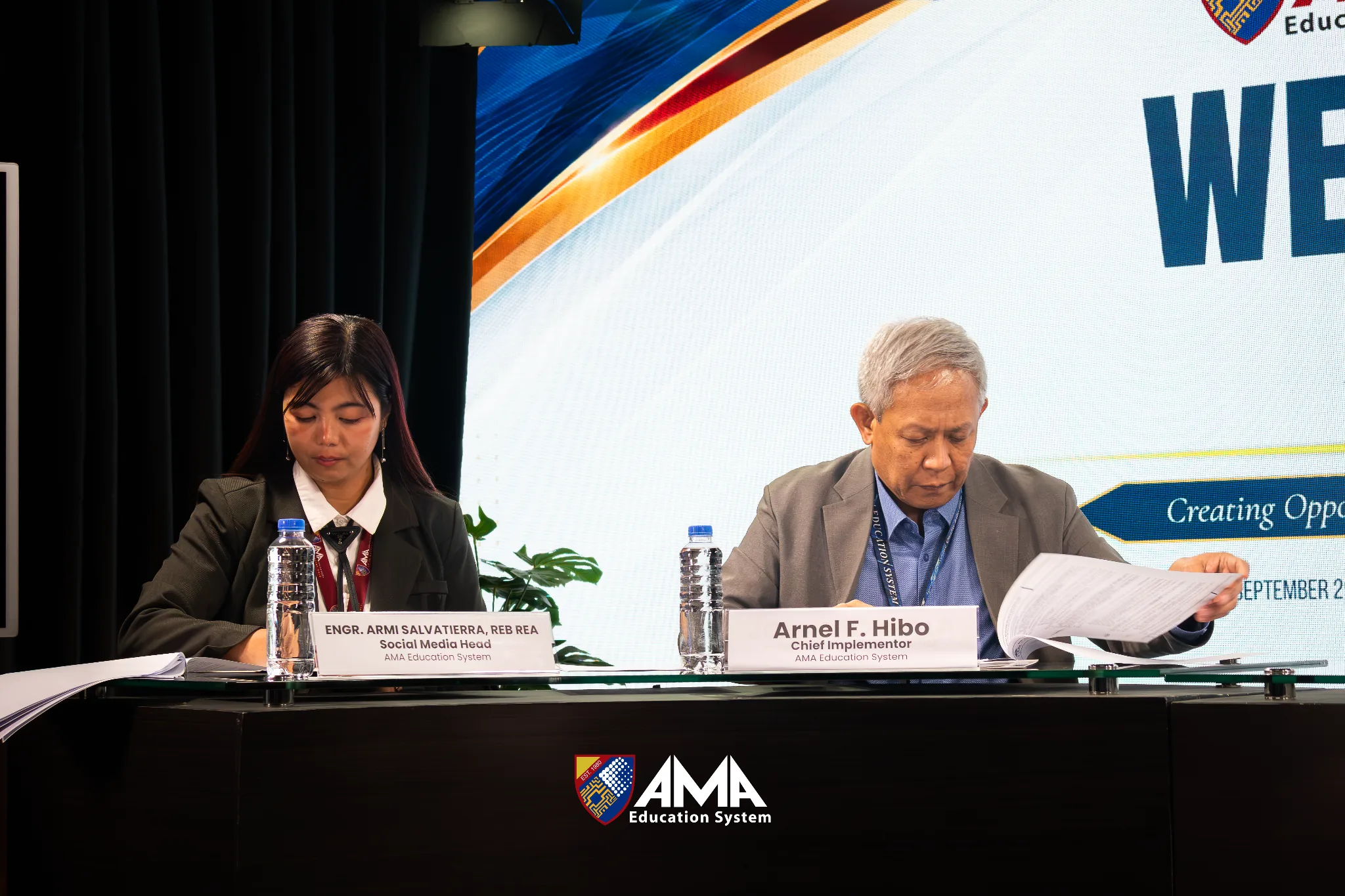 AMA Education System and RDR executives signing the memorandum of agreement documents